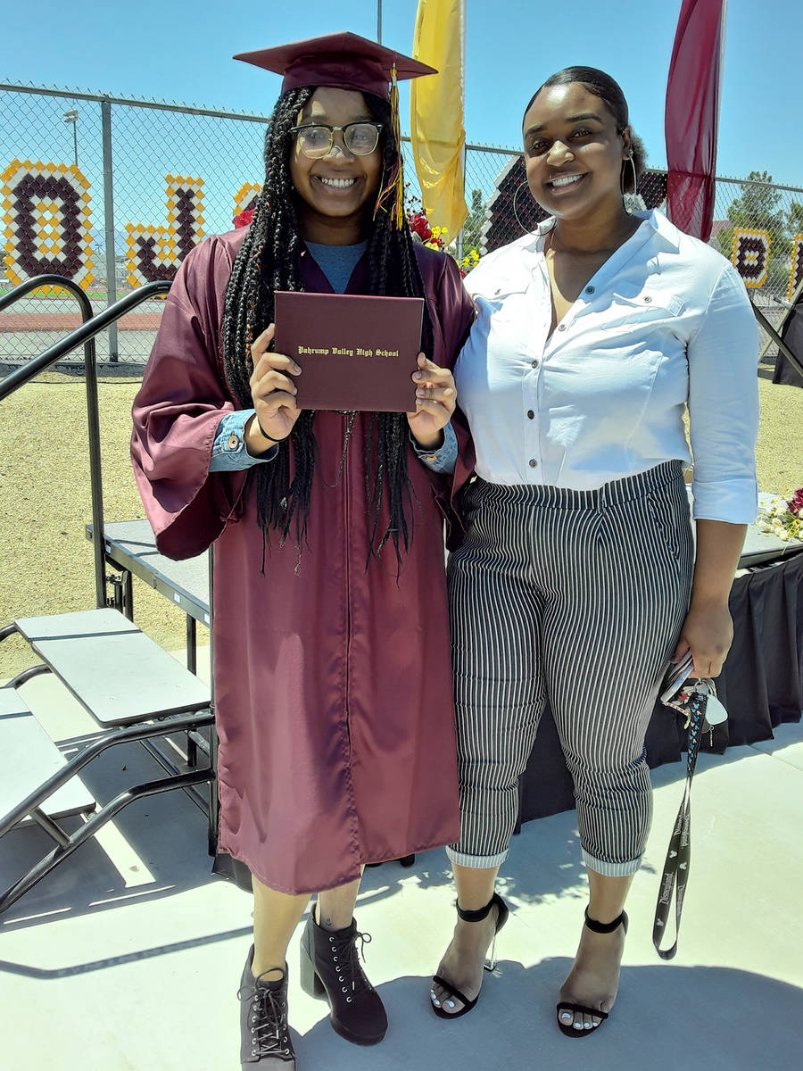 Selwyn Harris/Pahrump Valley Times Joined by her sister, graduate Jasmin Minor will attend a co ...