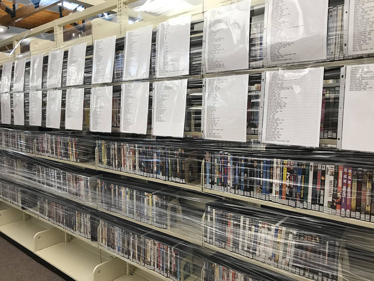 Robin Hebrock/Pahrump Valley Times The DVD section at the Pahrump Community Library has been wr ...