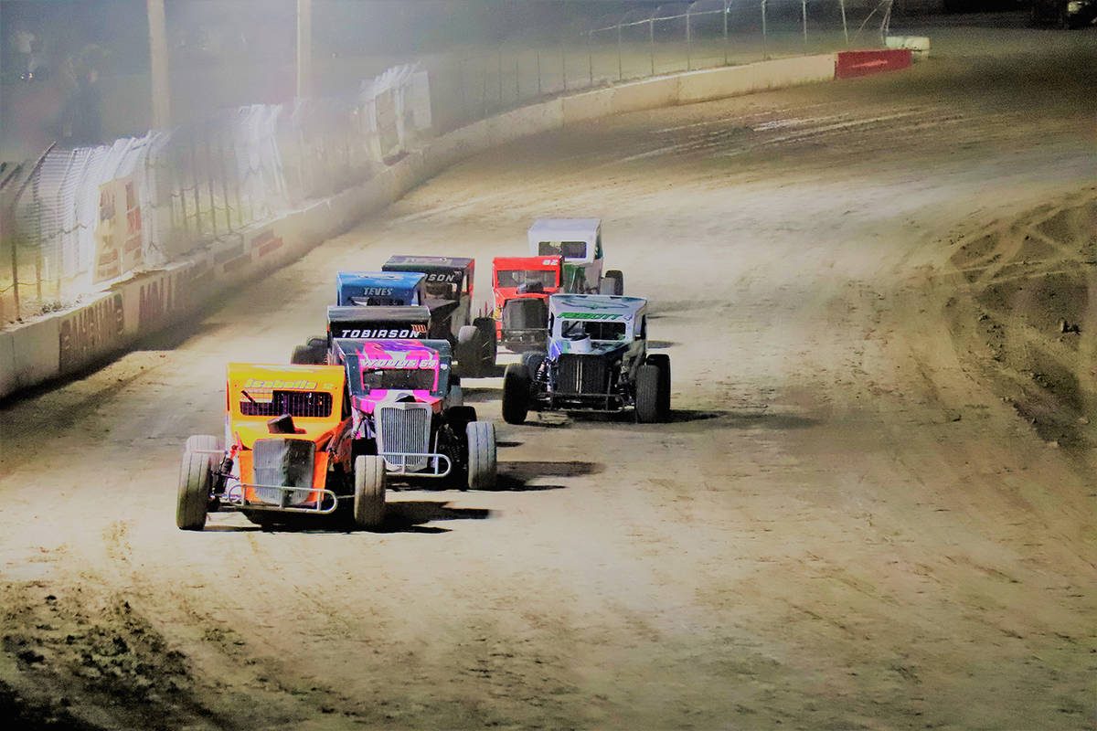 Digital Storm Photography/Special to the Pahrump Valley Times The pack circles the track during ...