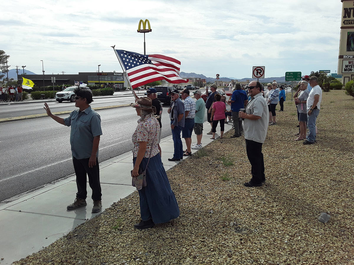 Selwyn Harris/Pahrump Valley Times Many drivers honked their horns and waved at rally attendees ...