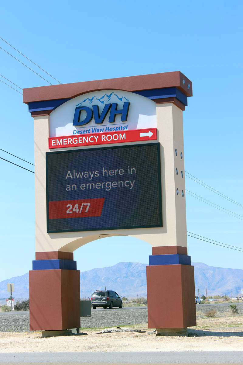 Jeffrey Meehan/Pahrump Valley Times A large sign at Highway 372 and Lola Lane points toward eme ...