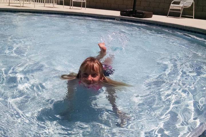 Lexis Bray/Pahrump Valley Times This file photo shows a valley youngster cooling off in the kid ...