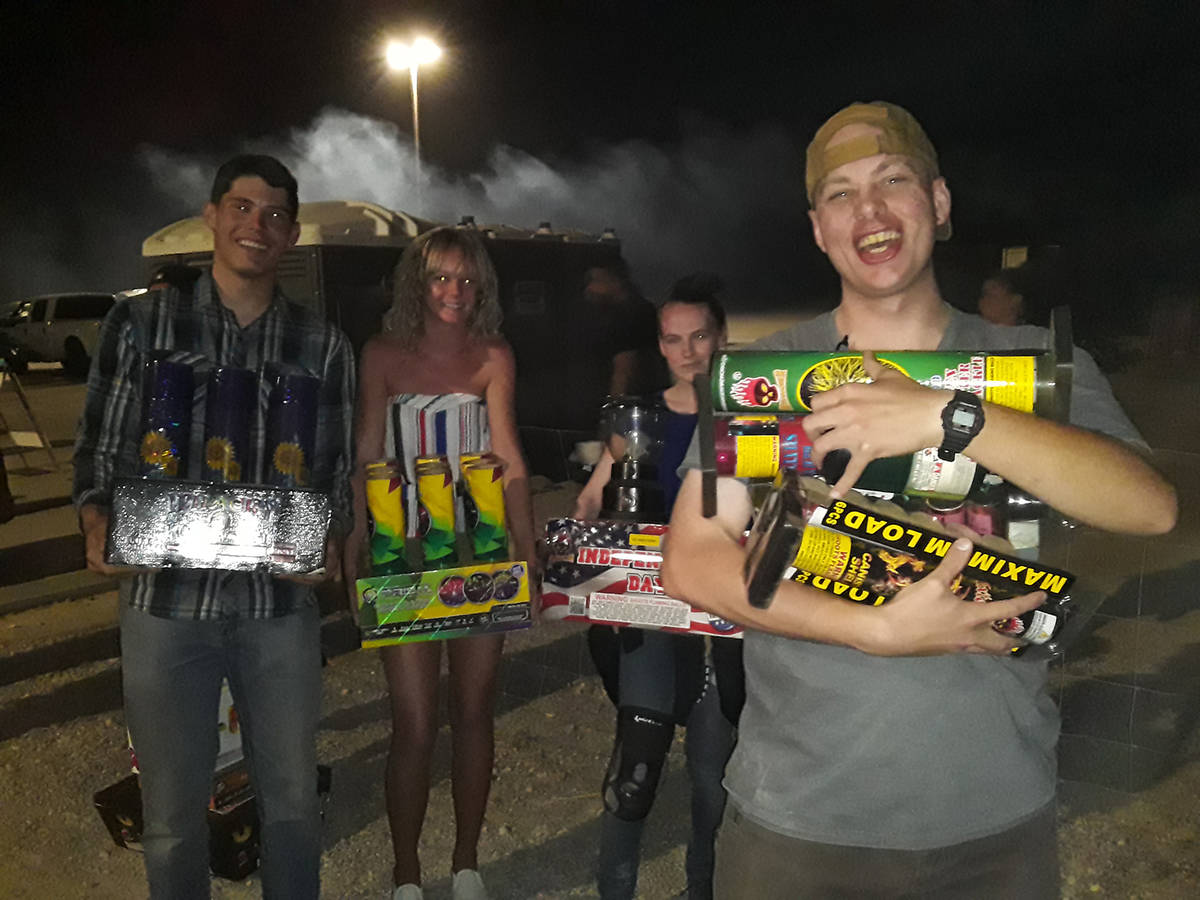 Selwyn Harris/Pahrump Valley Times Hundreds of Fourth of July revelers set off fireworks at the ...