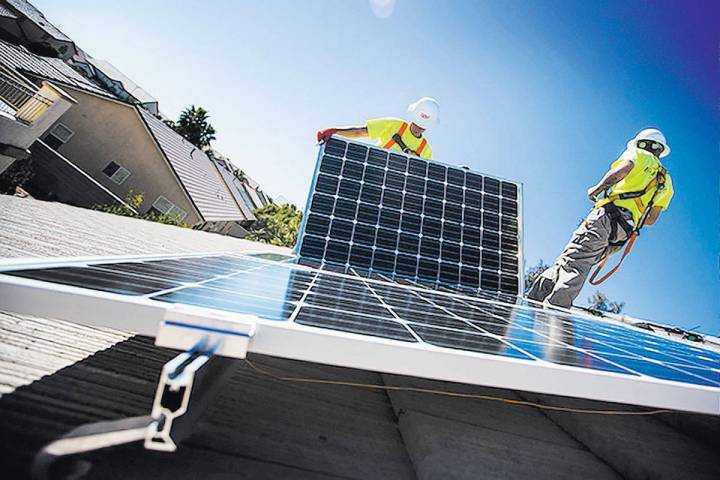 Las Vegas Review-Journal-file Electric vehicle charging, distributed generation like solar and ...