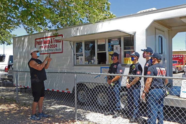 Robin Hebrock/Pahrump Valley Times David Hiebert is shown snapping a photo of area members of t ...