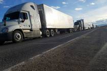 David Jacobs/Pahrump Valley Times Truck traffic backs up near the scene of a crash along U.S. H ...