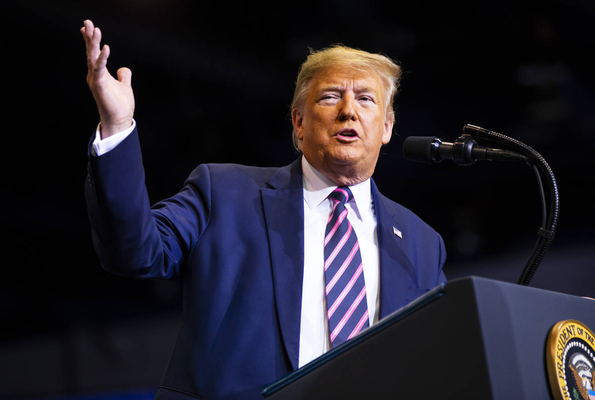 Chase Stevens/Las Vegas Review-Journal President Donald Trump speaks during a rally at the Las ...