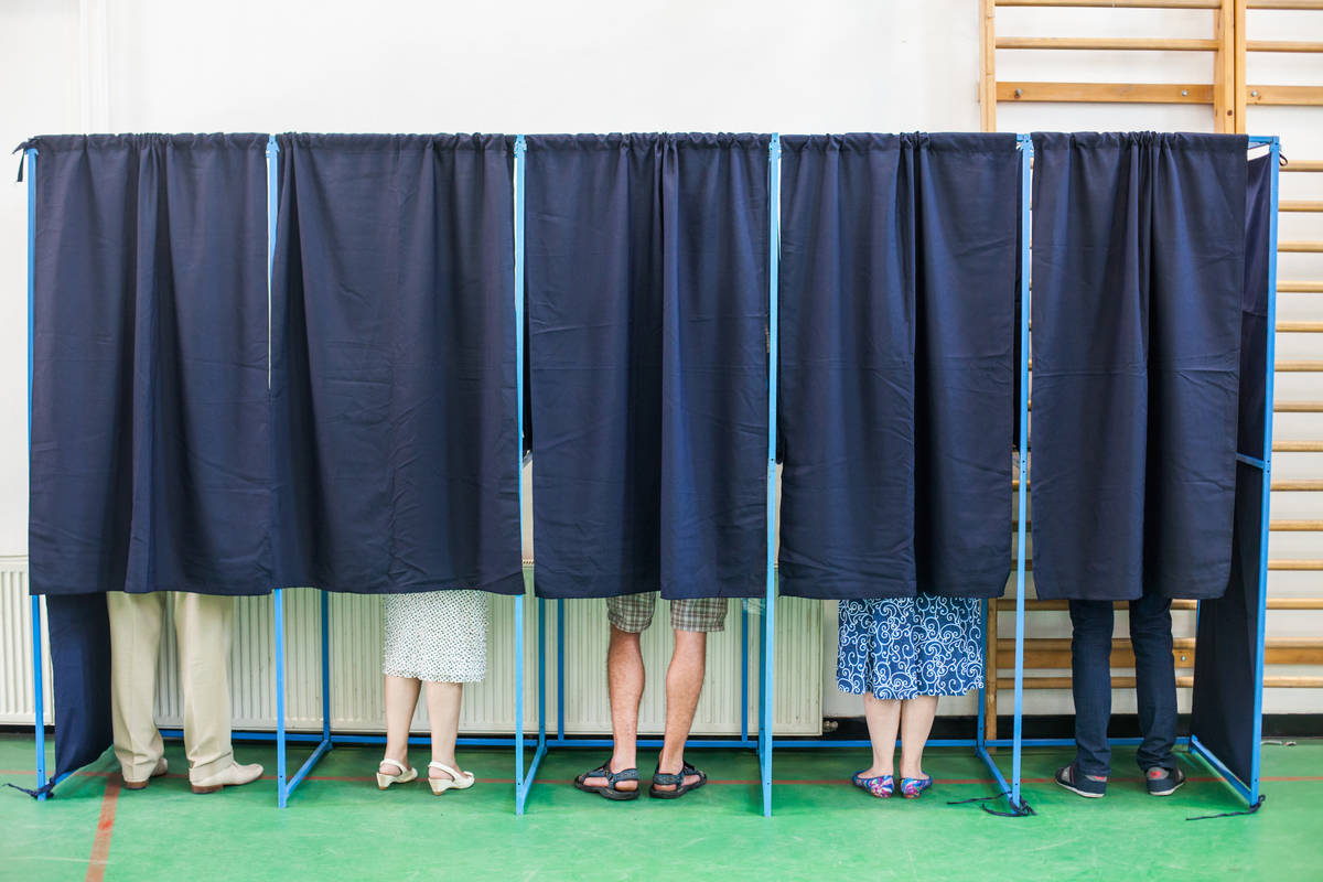 Getty Images Freelance columnist and businessman Tim Burke writes about in-person voting.