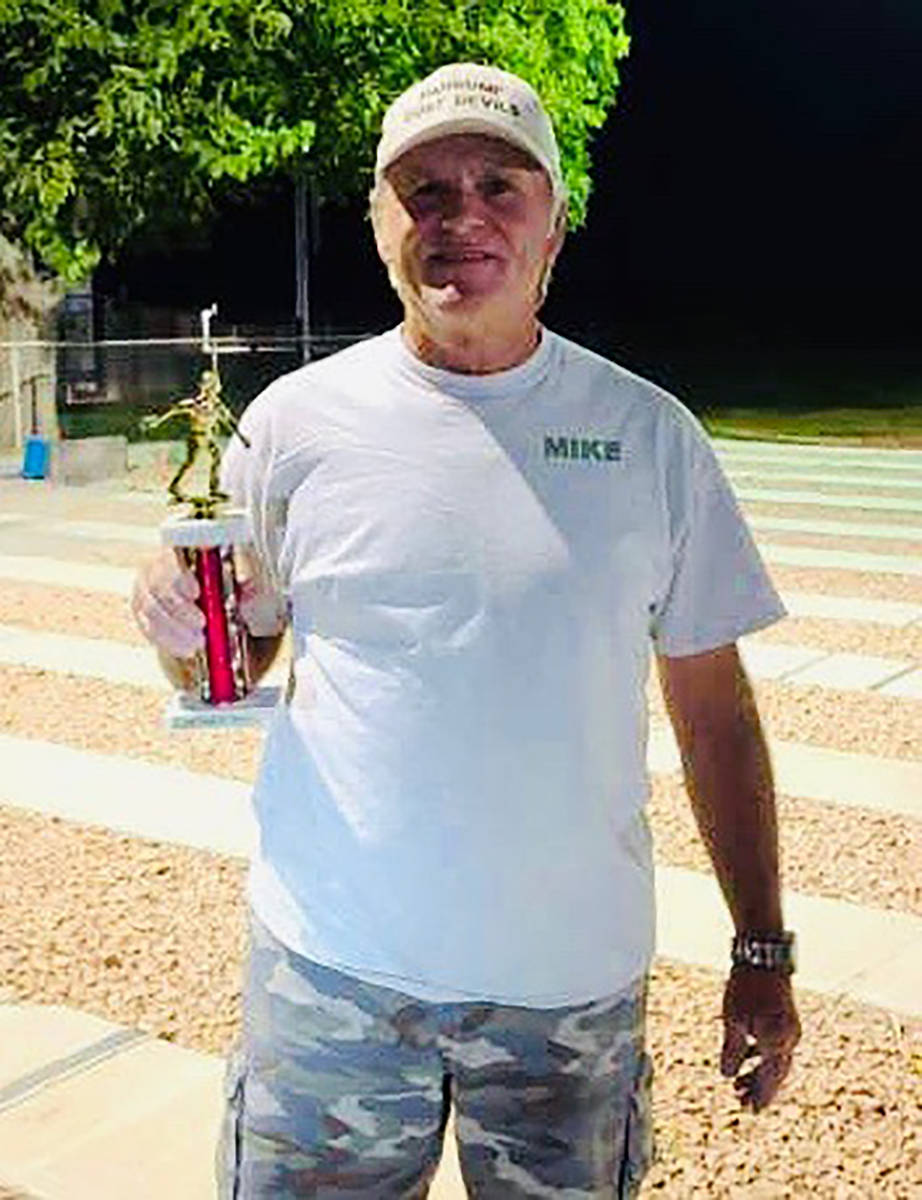 Kim Dilger/Special to the Pahrump Valley Times Tournament host Mike Nicosia fell to Lathan Dilg ...