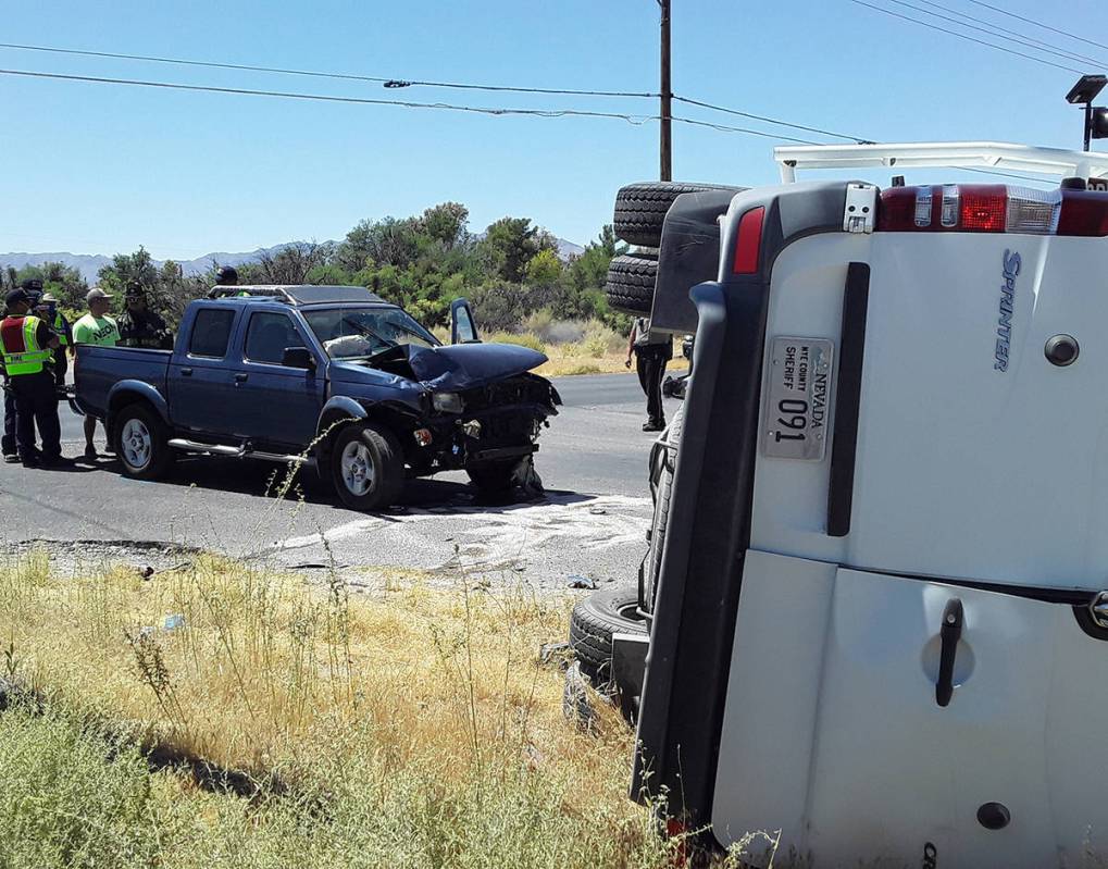 Selwyn Harris/Pahrump Valley Times A Nye County Sheriff's Office animal control officer, along ...