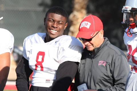Bizuayehu Tesfaye/Special to the Pahrump Valley Times UNLV running back Charles Williams chats ...