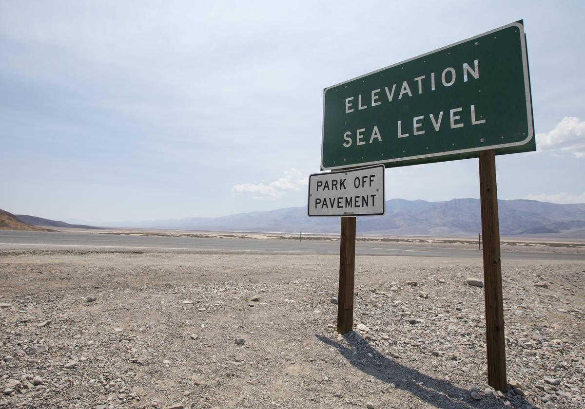 Richard Brian Las Vegas Review-Journal A sign marking sea level is seen on the side near the I ...