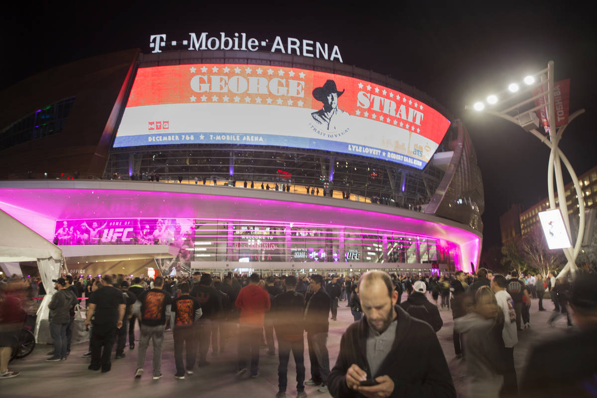 Benjamin Hager/Las Vegas Review-Journal Concertgoers line up outside T-Mobile Arena before the ...