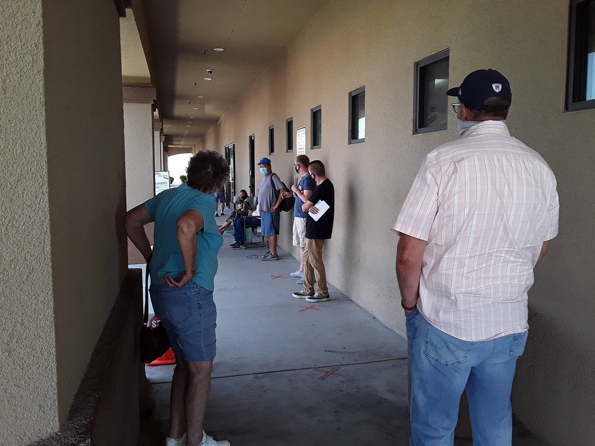 Selwyn Harris/Pahrump Valley Times Many Pahrump DMV customers are decrying the long wait times ...