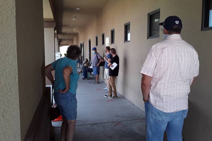 Selwyn Harris/Pahrump Valley Times Many Pahrump DMV customers are decrying the long wait times ...