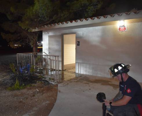Special to the Pahrump Valley Times Fire crews extinguished a fire at the public restrooms dire ...