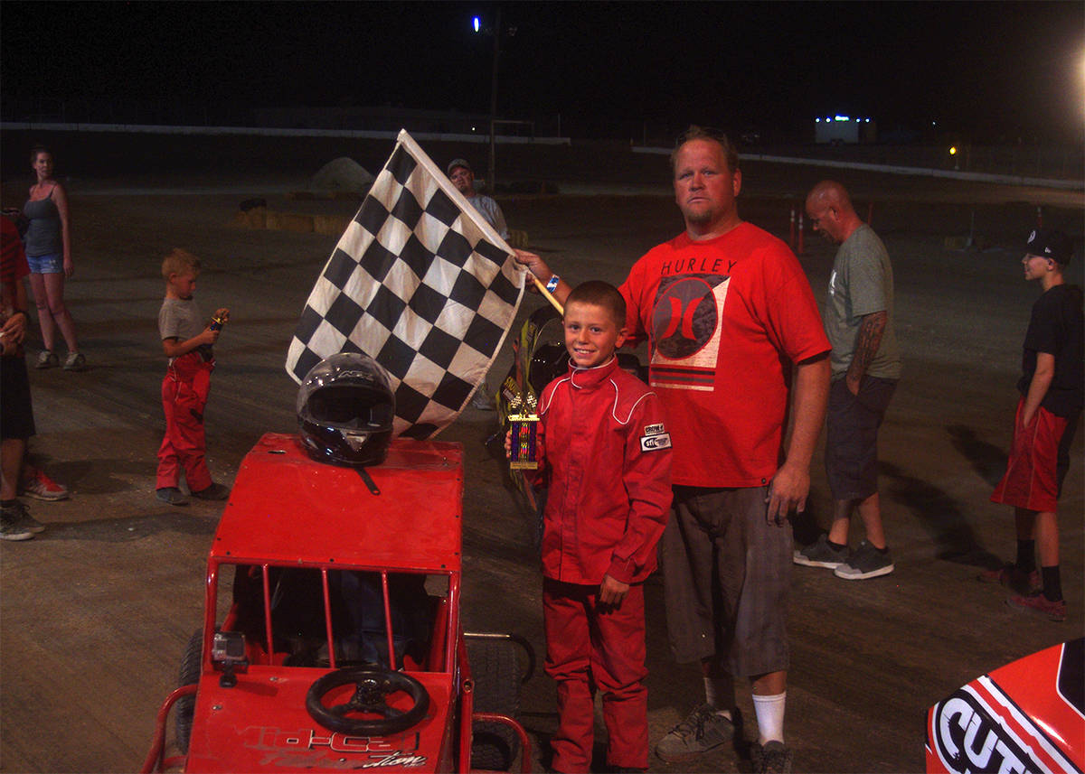 Pahrump Valley Times file Dusty Park with Booey McClard after McClard won a mini dwarf race in ...