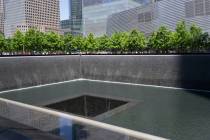 Getty Images Pictured is the 9/11 memorial in New York. The memorial is two fountains in the l ...