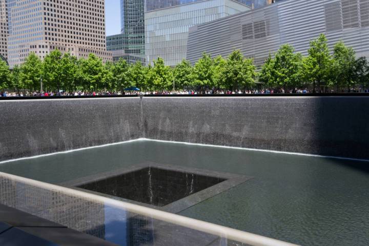 Getty Images Pictured is the 9/11 memorial in New York. The memorial is two fountains in the l ...