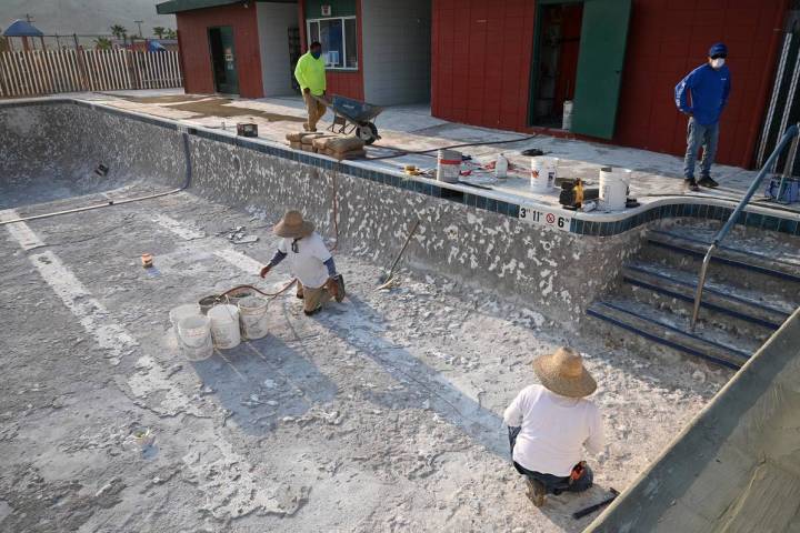 Richard Stephens/Special to the Pahrump Valley Times Crews work on the pool in Beatty on Thurs ...