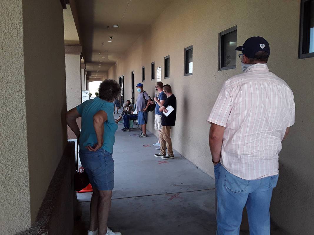 Selwyn Harris/Pahrump Valley Times Many Pahrump DMV customers decried the long wait times in or ...