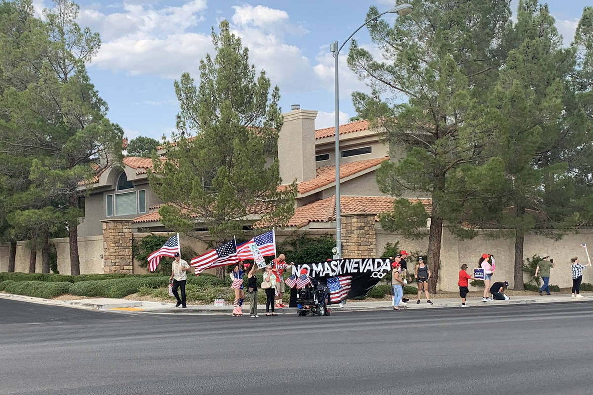 Alexis Ford/Las Vegas Review-Journal No Mask Nevada holds a rally near Gov. Steve Sisolak’s s ...