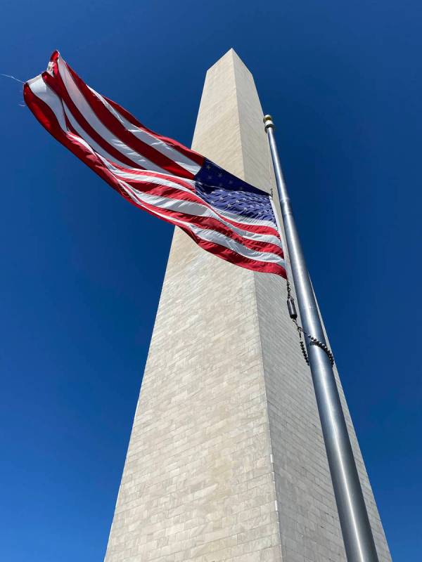 Getty Images An American flag flies half-staff at the Washington Monument in honor of Ruth Bad ...