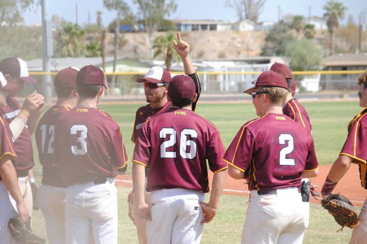 Charlotte Uyeno/Pahrump Valley Times Jalen Denton rallies his Trojans Gold teammates during the ...