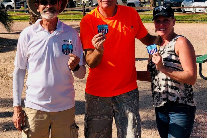 Jim Hatch/Special to the Pahrump Valley Times Tournament champion Lathan Dilger, center, is fla ...