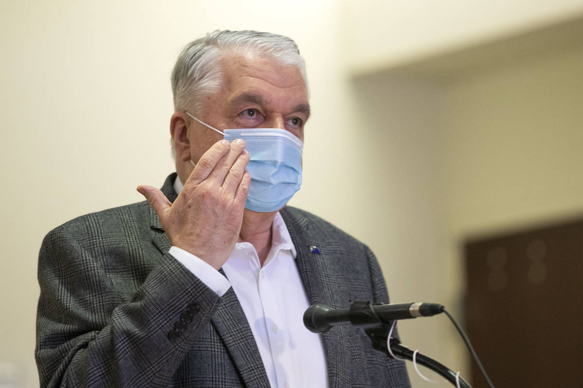 Ellen Schmidt/Las Vegas Review-Journal Gov. Steve Sisolak speaks during an update on the state' ...