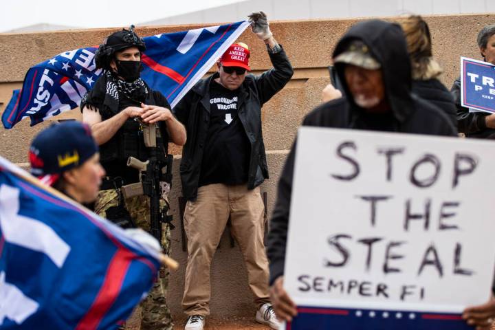 Supporters of President Donald Trump protest outside of the Clark County Election Department af ...