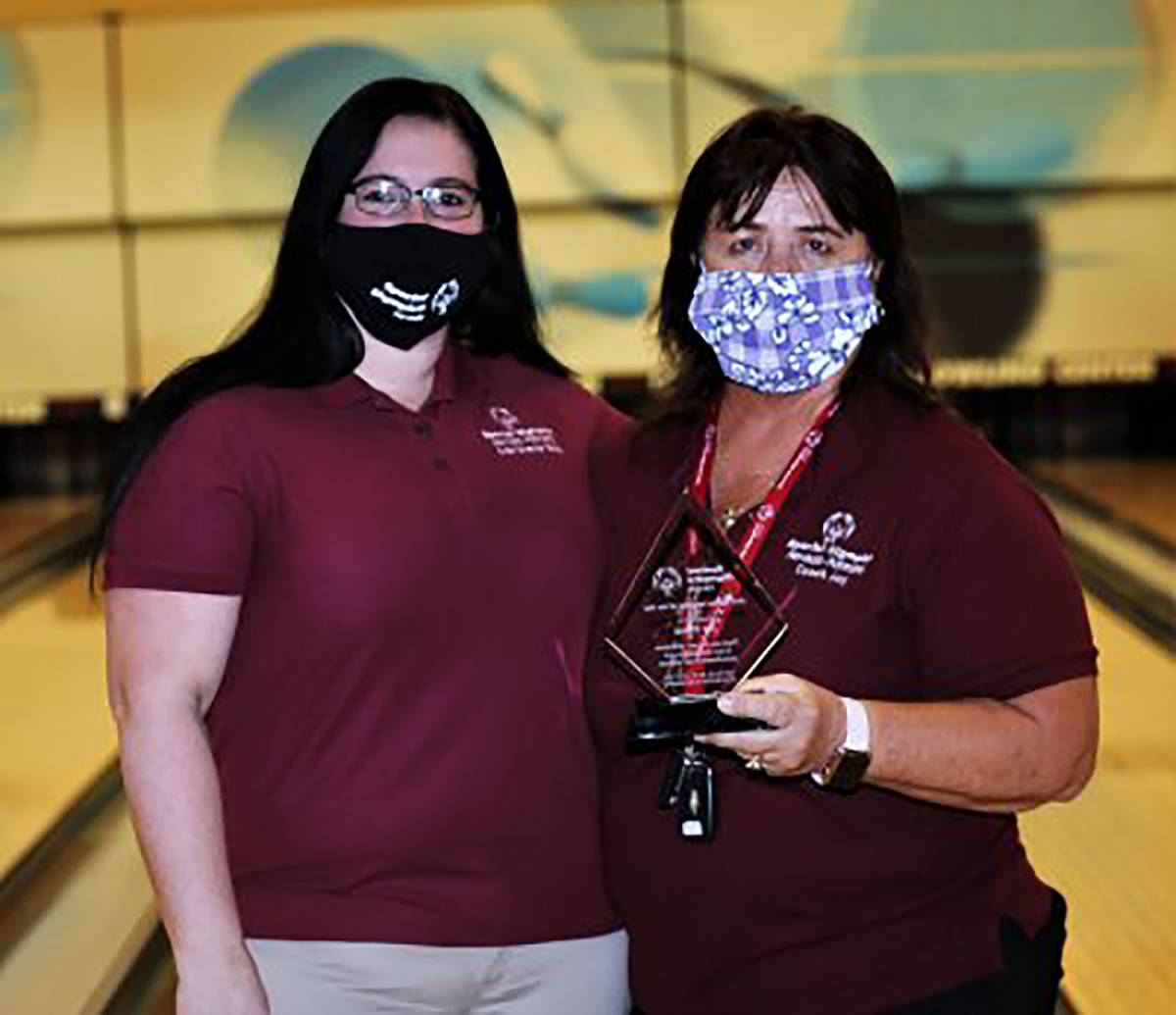 Randy Gulley/Special to the Pahrump Valley Times Joy Theus, right, accepts an award from Bobbi- ...