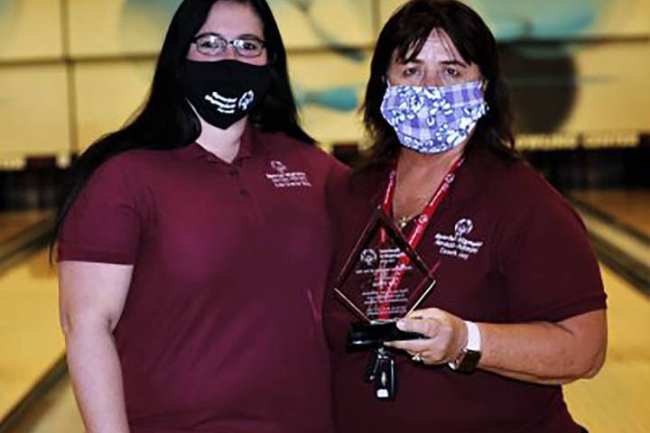 Randy Gulley/Special to the Pahrump Valley Times Joy Theus, right, accepts an award from Bobbi- ...