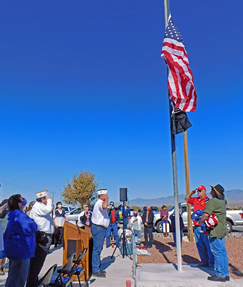 Robin Hebrock/Pahrump Valley Times VFW Post #10054 officers, veterans and civilians salute the ...