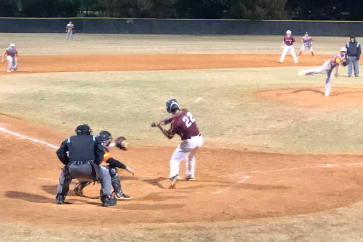 Tom Rysinski/Pahrump Valley Times Zack Cuellar eyes an incoming pitch during Friday night's Pah ...