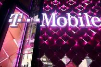 K.M. Cannon Las Vegas Review-Journal The T-Mobile store on the Strip on opening night Thursday, ...