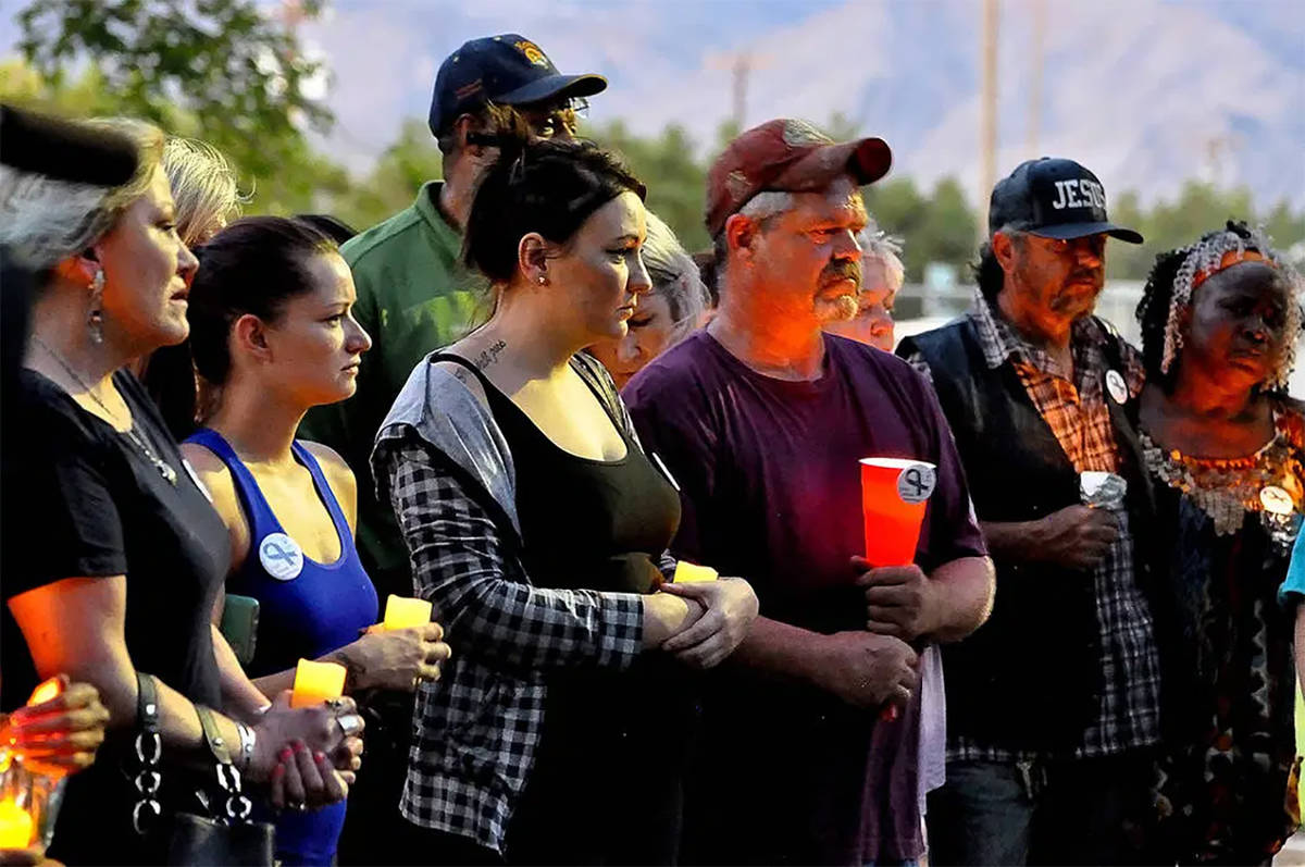 Horace Langford Jr./Pahrump Valley Times Members of the community held a candlelight vigil in t ...