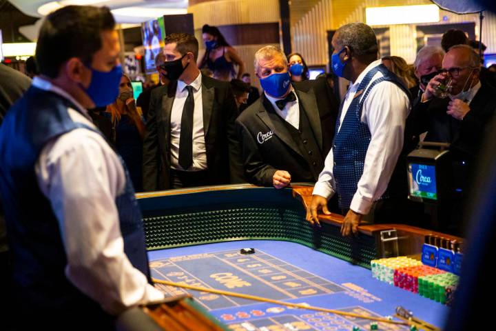 Chase Stevens/Las Vegas Review-Journal Circa owner Derek Stevens checks on a craps table shortl ...