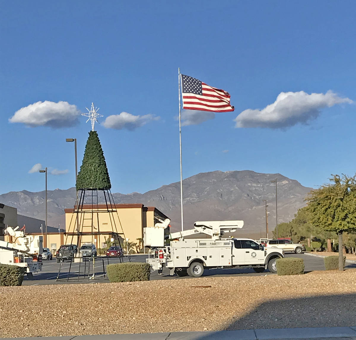 Robin Hebrock/Pahrump Valley Times Crews with Valley Electric Association are seen erecting the ...