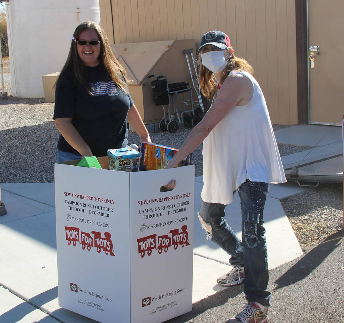 Special to the Pahrump Valley Times Volunteers manning the VFW's Toys for Tots Poker Run are se ...