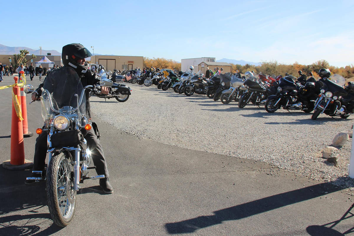 Special to the Pahrump Valley Times A VFW Toys for Tots Poker Run participant is seen readying ...
