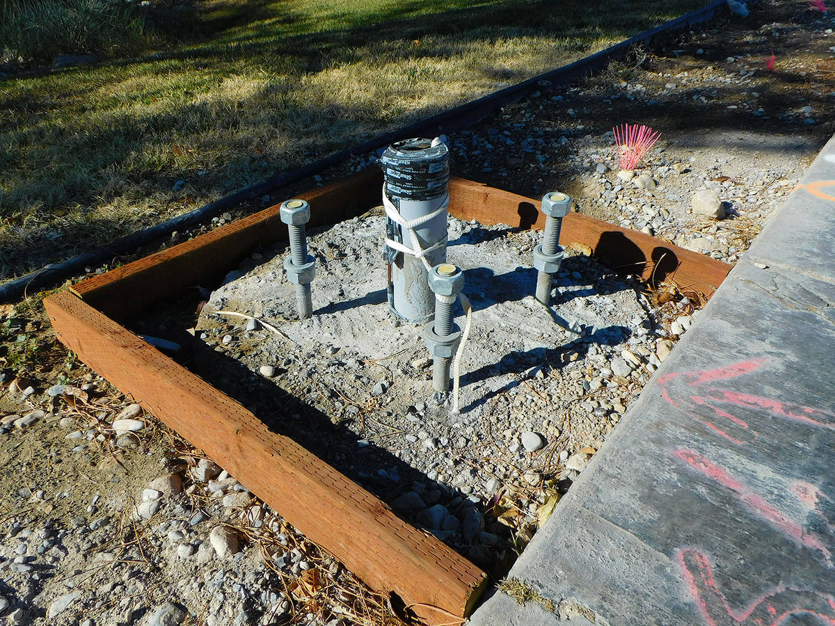 Robin Hebrock/Pahrump Valley Times Signal pole foundations for the flashing beacon that will sp ...