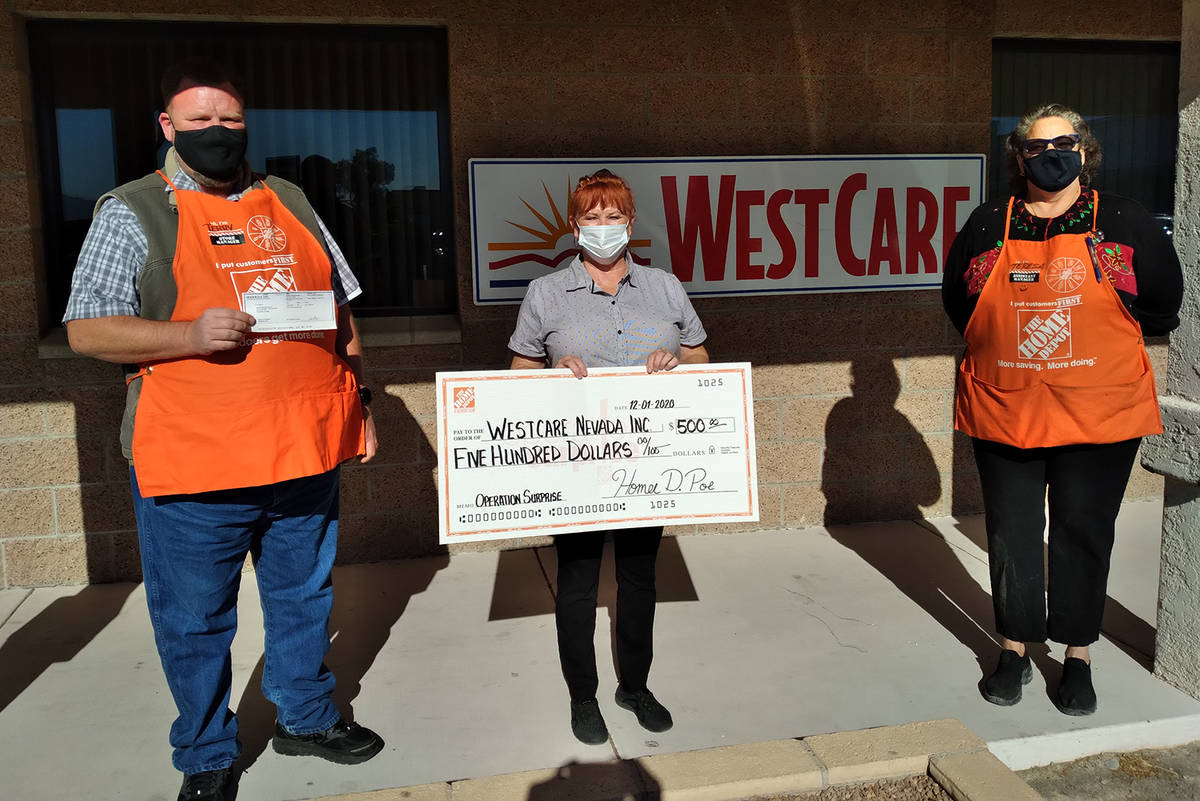 Selwyn Harris/Pahrump Valley Times WestCare Program Manager Laurie Parker, center, said she was ...