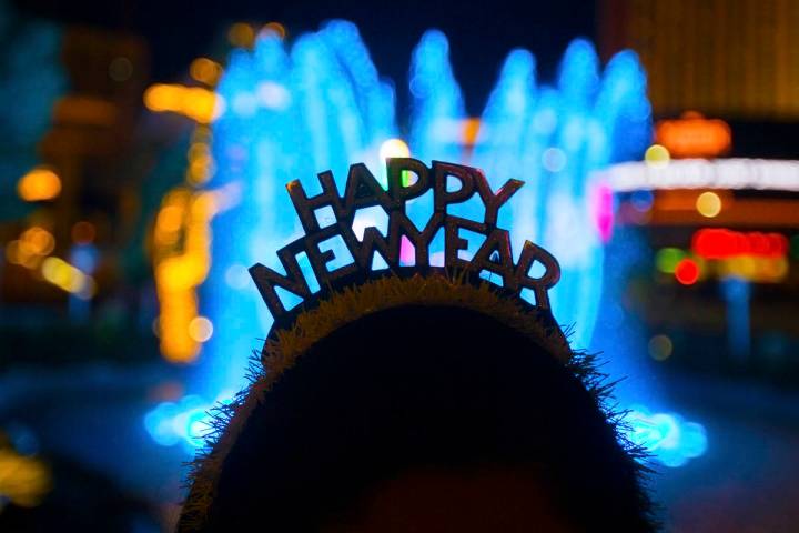 Fatima Peña, from Napa, Calif., enjoys the fountains outside Wynn Las Vegas on the Strip o ...