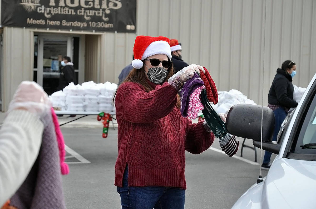 Horace Langford Jr./Pahrump Valley Times Knitted hats and scarves were also handed out to famil ...