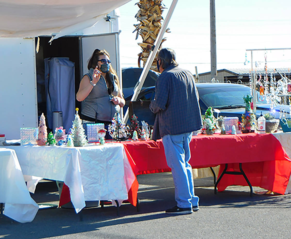 Robin Hebrock/Pahrump Valley Times A patron of the Winter Wellness Event is seen discussing pro ...