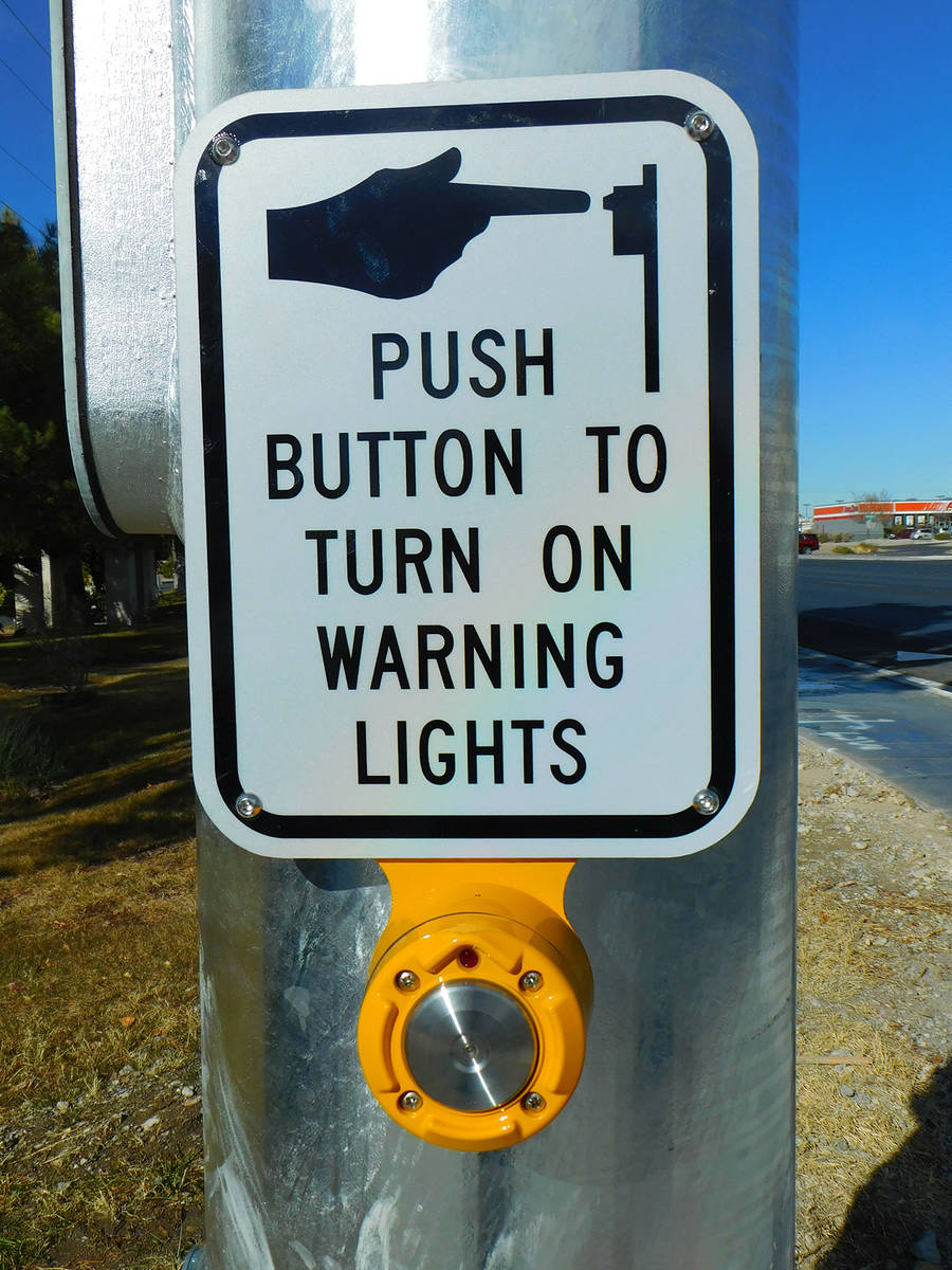Robin Hebrock/Pahrump Valley Times The new crosswalk includes a push-button activated overhead ...