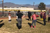 Tom Rysinski/Pahrump Valley Times PVHS softball coach Cassondra Lauver talks to her players bef ...