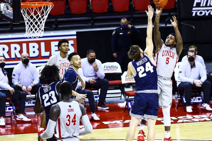 Chase Stevens/Special to the Pahrump Valley Times UNLV guard David Jenkins Jr. shoots over Utah ...