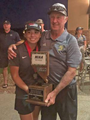 File photo Then-junior Breanne Nygaard and PVHS golf coach Bob Hopkins pose with the trophy aft ...